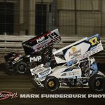 Bill Balog (#17B) inside of Brent Marks (#19M) Thursday at Knoxville Raceway. (Mark Funderburk Photo)