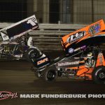 Logan Schuchart (#1S) racing with Chris Martin (#44) Thursday at Knoxville Raceway. (Mark Funderburk Photo)