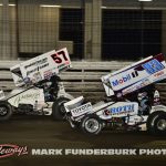 Kyle Larson (#57) racing with Buddy Kofoid (#83) Thursday at Knoxville Raceway. (Mark Funderburk Photo)