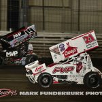 Brent Marks (#19) racing with Brian Brown (#21) Thursday at Knoxville Raceway. (Mark Funderburk Photo)