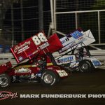 Austin McCarl (#88) racing with Buddy Kofoid (#83) Thursday at Knoxville Raceway. (Mark Funderburk Photo)