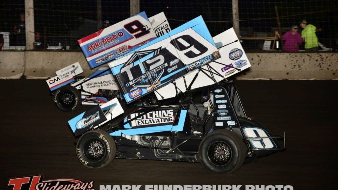 Tyler Duff (#9) racing with Paul Nienhiser (#9X) Friday at Lincoln Speedway. (Mark Funderburk Photo)