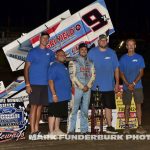 Paul Nienhiser with his crew after winning the Midwest Open Wheel Association feature Friday at Lincoln Speedway. (Mark Funderburk Photo)