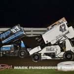 Kurt Mueller (#83), Tony Shilling (#47), and Alex Vande Voort (#5A) racing for position Monday night at Marshalltown Speedway. (Mark Funderburk Photo)
