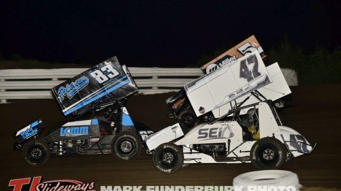 Kurt Mueller (#83), Tony Shilling (#47), and Alex Vande Voort (#5A) racing for position Monday night at Marshalltown Speedway. (Mark Funderburk Photo)