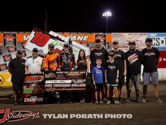 Ryan Timms with his crew after winning the feature event on the final lap Sunday night at Huset's Speedway. (Tyler Porath Photo)