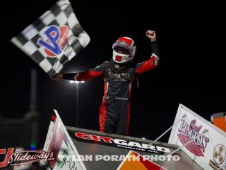 Ryan Timms celebrates after a last lap pass for the win Sunday night at Huset's Speedway. (Tyler Porath Photo)