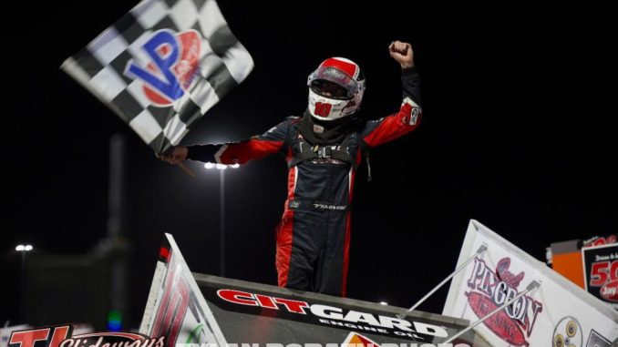 Ryan Timms celebrates after a last lap pass for the win Sunday night at Huset's Speedway. (Tyler Porath Photo)