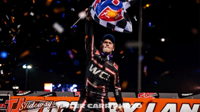 Emerson Axsom celebrates his first career World of Outlaws feature victory at Huset's Speedway. (Tyler Carr Photo)