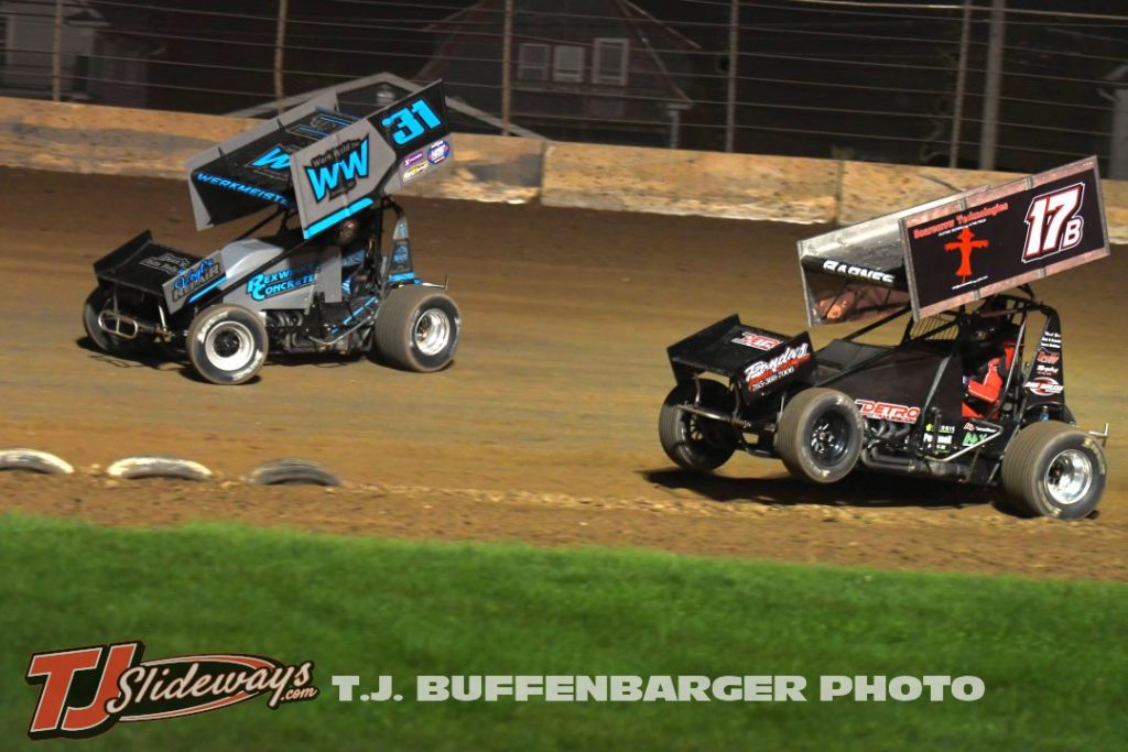 Koby Werkmeister (#31W) and Dean Barnes (#17B) racing for position Saturday at the Plymouth Dirt Track. (T.J. Buffenbarger Photo)