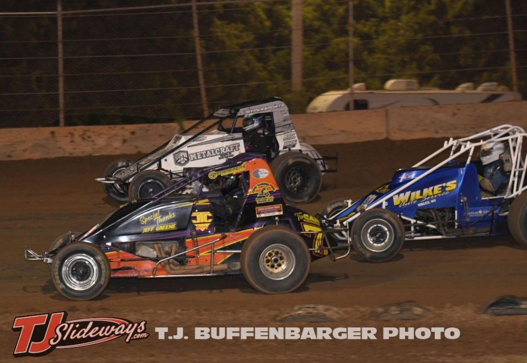 Josh Davidson (#7D), Allan Hafford (#38), and Eric Wilke (#24) racing for position Saturday night at the Plymouth Dirt Track. (T.J. Buffenbarger Photo)