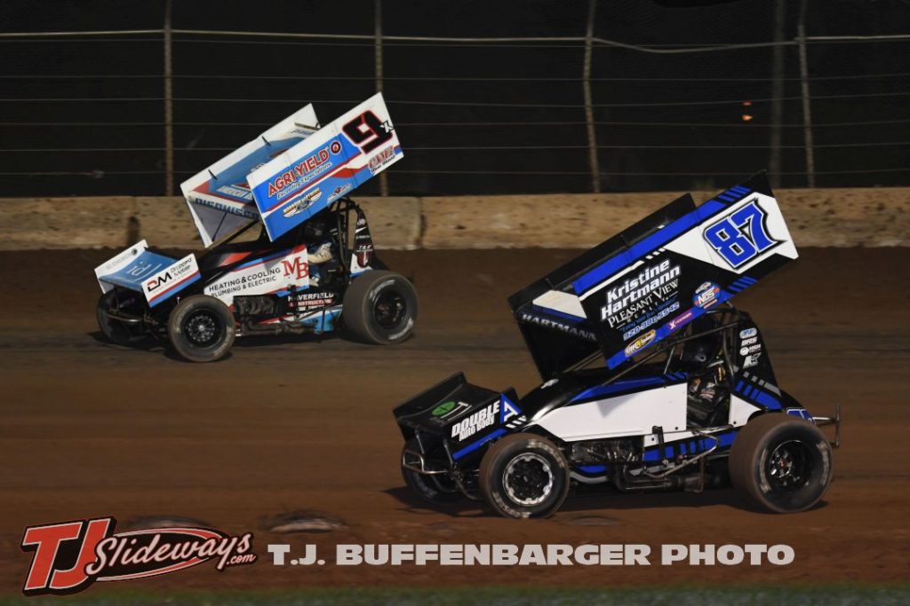 Austin Hartmann (#87) and Paul Nienhiser (#9) racing for position Saturday at the Plymouth Dirt Track. (T.J. Buffenbarger Photo)