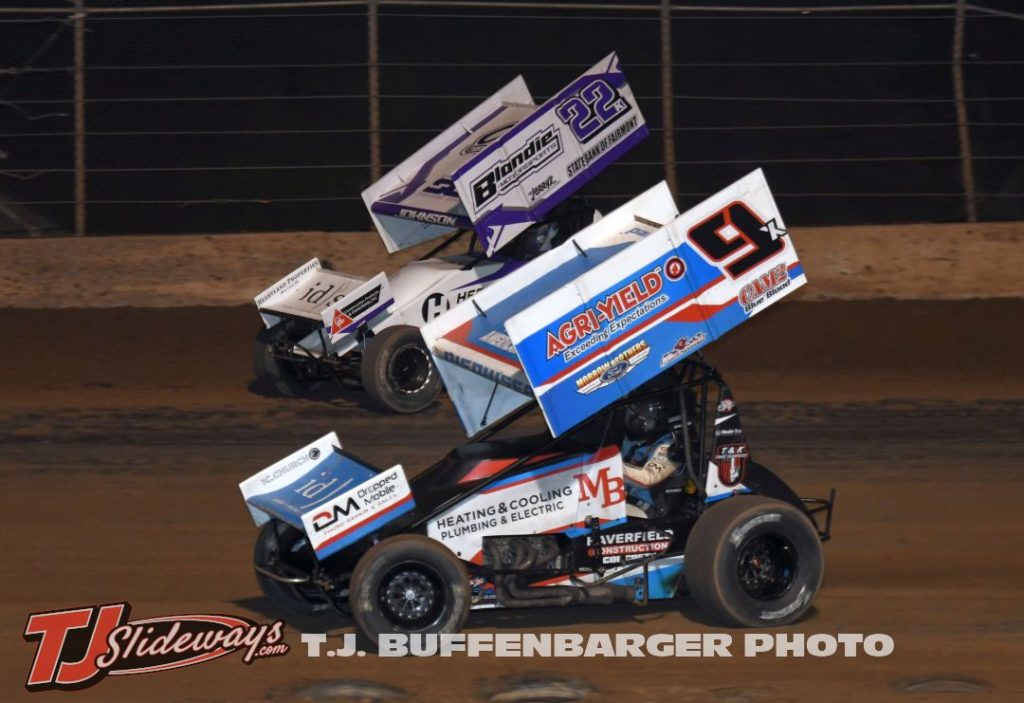 Paul Nienhiser (#9) racing with Caleb Johnson (#22) Saturday night at the Plymouth Dirt Track. (T.J. Buffenbarger Photo)