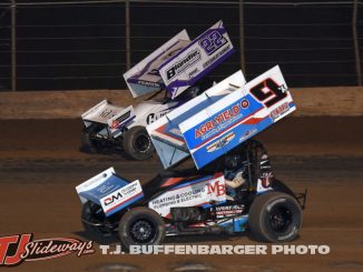 Paul Nienhiser (#9) racing with Caleb Johnson (#22) Saturday night at the Plymouth Dirt Track. (T.J. Buffenbarger Photo)