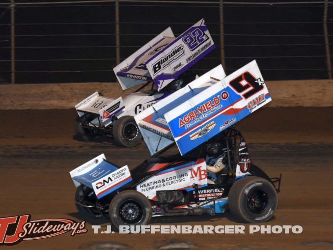 Paul Nienhiser (#9) racing with Caleb Johnson (#22) Saturday night at the Plymouth Dirt Track. (T.J. Buffenbarger Photo)