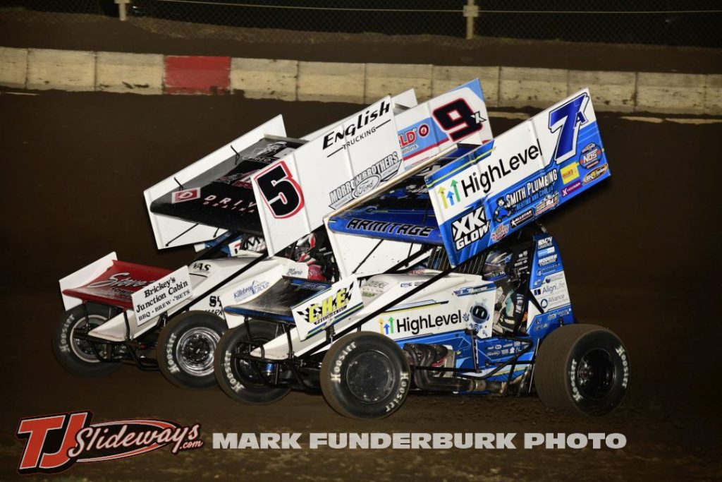 Will Armitage (#7A), Mario Clouser (#5H), and Jake Neuman (#9N) racing for position Friday at Jacksonville Speedway. (Mark Funderburk Photo)