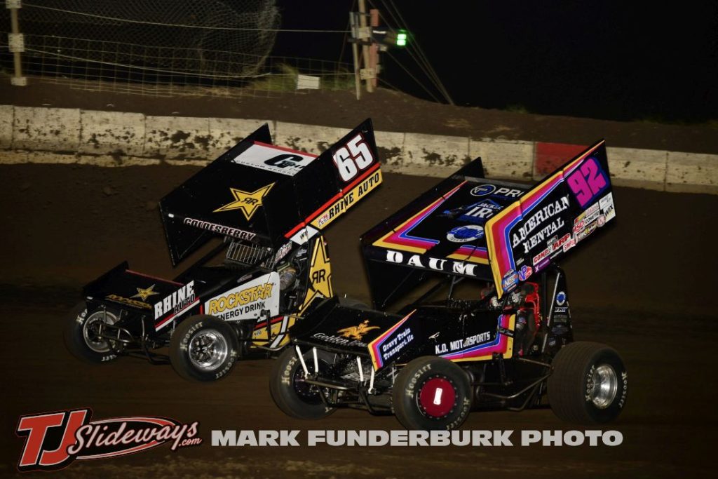 Jordan Golesberry (#65) racing with Zach Daum (#92) Friday at Jacksonville Speedway. (Mark Funderburk Photo)