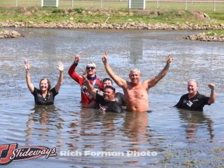 Winner C.J. Leary & the Team AZ / Petty-Rossi / Curb-Agajanian Racing crew celebrate Saturday's Ted Horn 100 USAC Silver Crown victory by taking a dive into the infield pond at the Du Quoin State Fairgrounds in southern Illinois. (Rich Forman Photo)