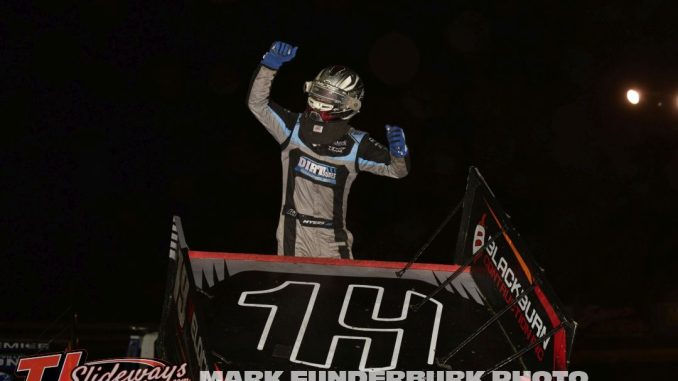 Joel Myers Jr. celebrates after winning the Midwest Open Wheel Association portion of the Ron Milton Race of Champions Friday at Jacksonville Speedway. (Mark Funderburk Photo)